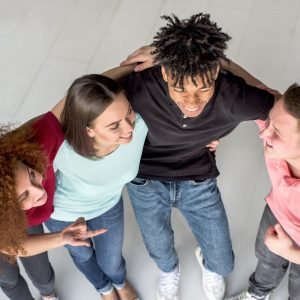 elevated-view-cheerful-friends-having-conversation